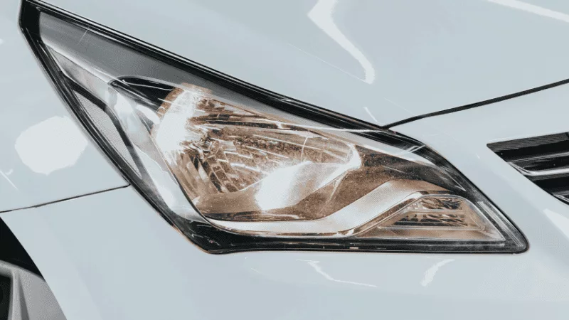 a close-up of a dual-beam headlight