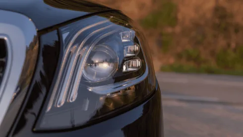 A close-up of the lights of a parked car.